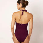 Ikonō La Versatile one-piece swimwear in aubergine. This high-quality, eco-friendly swimsuit is designed for comfort and support, featuring a soft lining and sculpting effect. Perfect for all body types, including post-surgery and mastectomy needs. A stylish, inclusive swimwear option. #BeWhatMovesYou