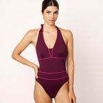 Ikonō La Versatile one-piece swimwear in aubergine. This high-quality, eco-friendly swimsuit is designed for comfort and support, featuring a soft lining and sculpting effect. Perfect for all body types, including post-surgery and mastectomy needs. A stylish, inclusive swimwear option. #BeWhatMovesYou