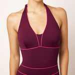Ikonō La Versatile one-piece swimwear in aubergine. This high-quality, eco-friendly swimsuit is designed for comfort and support, featuring a soft lining and sculpting effect. Perfect for all body types, including post-surgery and mastectomy needs. A stylish, inclusive swimwear option. #BeWhatMovesYou