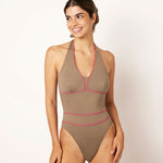 Ikonō La Versatile one-piece swimwear in Tierra. This high-quality, eco-friendly swimsuit is designed for comfort and support, featuring a soft lining and sculpting effect. Perfect for all body types, including post-surgery and mastectomy needs. A stylish, inclusive swimwear option. #BeWhatMovesYou