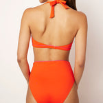 La Versatile bikini swimsuit in orange with high-waist bikini bottom, designed for comfort and support. Made from eco-friendly materials, perfect for all body types, including post-surgery swimwear needs. A stylish and inclusive swimwear choice by Ikonō.#BeWhatMovesYou