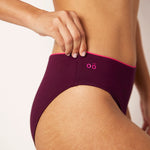 Ikonō La Versatile bikini in aubergine with a classic bottom. Designed for comfort and support, this stylish and inclusive swimwear features eco-friendly materials and a soft, supportive bra. Ideal for all body types, including post-surgery swimwear needs. A perfect combination of elegance and confidence. #BeWhatMovesYou