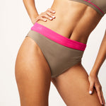 Ikonō La Versatile bikini swimsuit in Tierra with high-waist bottom. Designed for comfort and support, made from eco-friendly materials. Perfect for all body types, including post-surgery swimwear needs. A stylish and inclusive swimwear choice. #BeWhatMovesYou