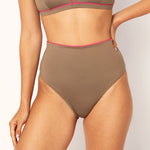 Ikonō La Versatile bikini swimsuit in Tierra with high-waist bottom. Designed for comfort and support, made from eco-friendly materials. Perfect for all body types, including post-surgery swimwear needs. A stylish and inclusive swimwear choice. #BeWhatMovesYou